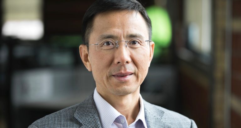 A portrait of Dr.Hongwei Wang, Chief of Talent Investment at Shenzhen Capital Group