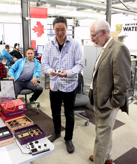 Calvin Chu, CEO of Palette Gear, explains his company’s product to Steve Blank in the University of Waterloo Velocity Garage, as Palette marketing head Ryan Van Stralen looks on.