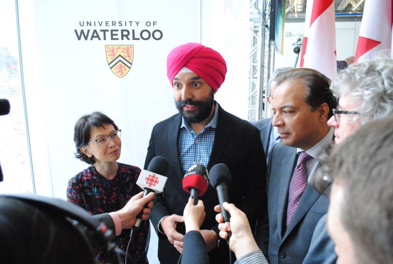 Federal Minister of Innovation, Science and Economic Development Navdeep Bains speaks with reporters