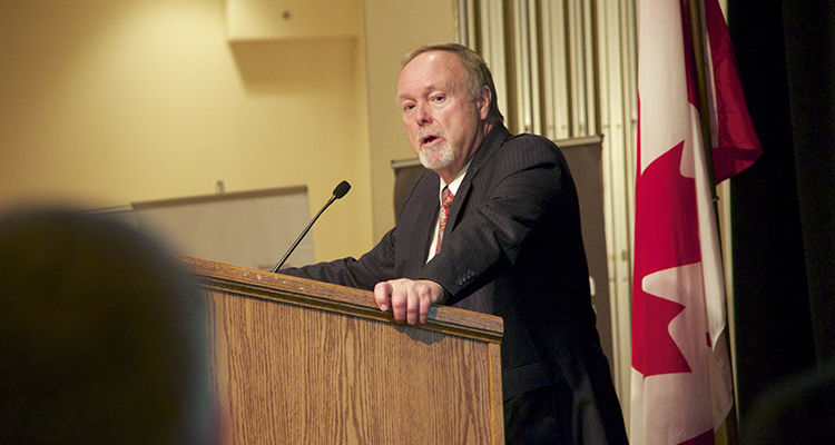 Sir Terry Matthews at podium