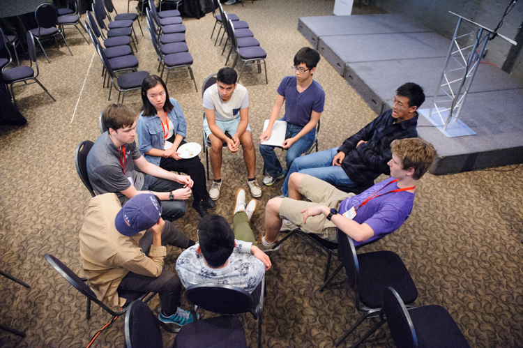 Bricks & Bytes team in a chair huddle