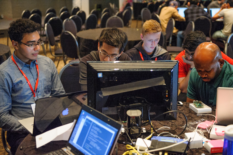 Attendees working on computers