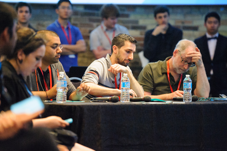 Judges Jay Shah of Google, Scott Greenberg of Thalmic, and Peter Huess UW of Velocity Foundry at the judging table