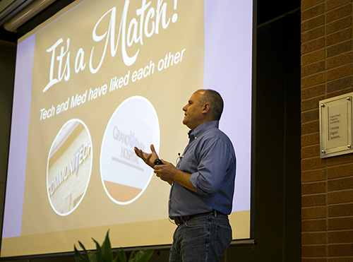 Communitech CEO Iain Klugman presenting on stage